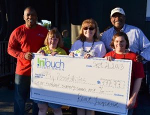 Plano Mayor Harry LaRosiliere with InTouch Credit Union CEO, Kent Lugrand presenting check to My Possibilities at the 2013 InTouch Credit Union Plano Balloon Festival
